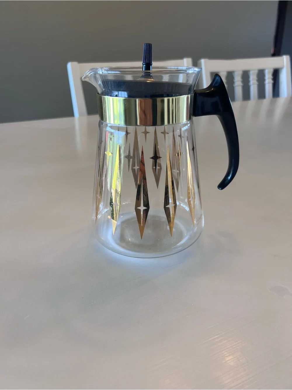 Pyrex Clear Glass Coffee Carafe with Gold Starburst Pattern and Black Handle